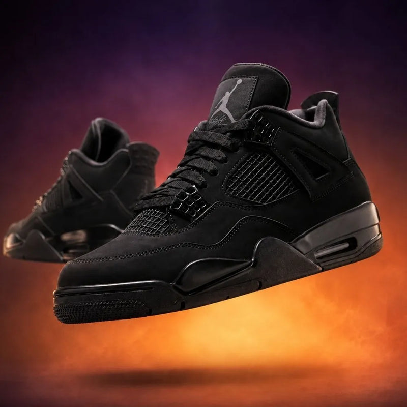 Black sneaker displayed in a studio setting